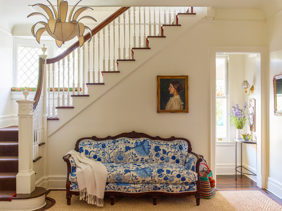 Larchmont Victorian - A bright, beautiful renovation of a happy house. Client's grandmother's settee and painting, refreshed and juxtaposed in a joyous combination, and we designed the ceiling light and had it custom made.
