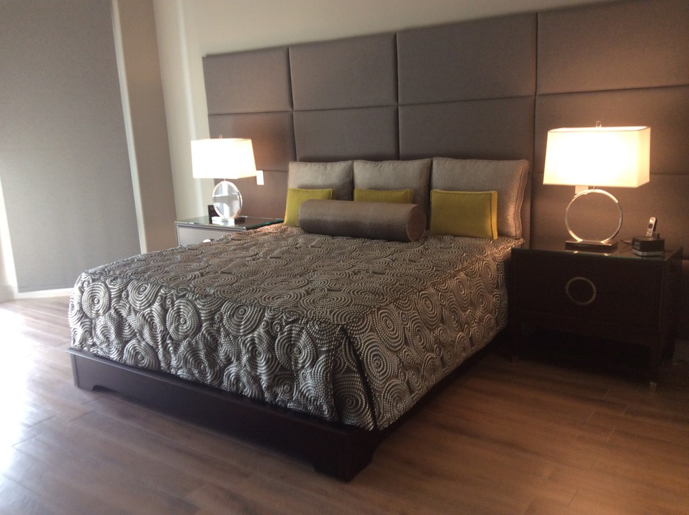 Inspiration for a large contemporary master bedroom in Austin with grey walls.