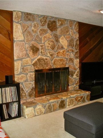 Cedar plank wall and light stone fireplace 70's house ...