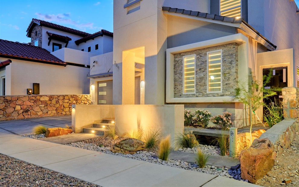 Design ideas for a small drought-tolerant backyard concrete paver garden path.