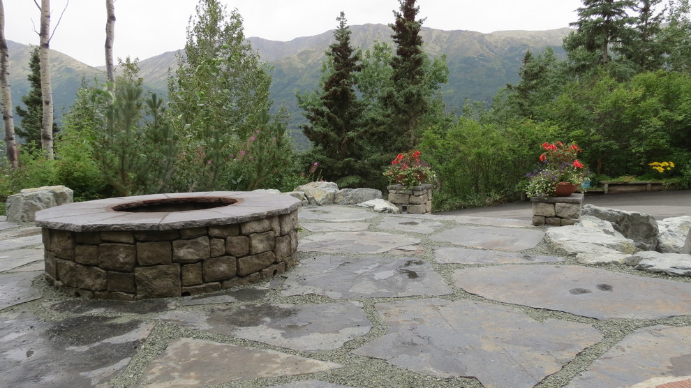 Example of a large mountain style home design design