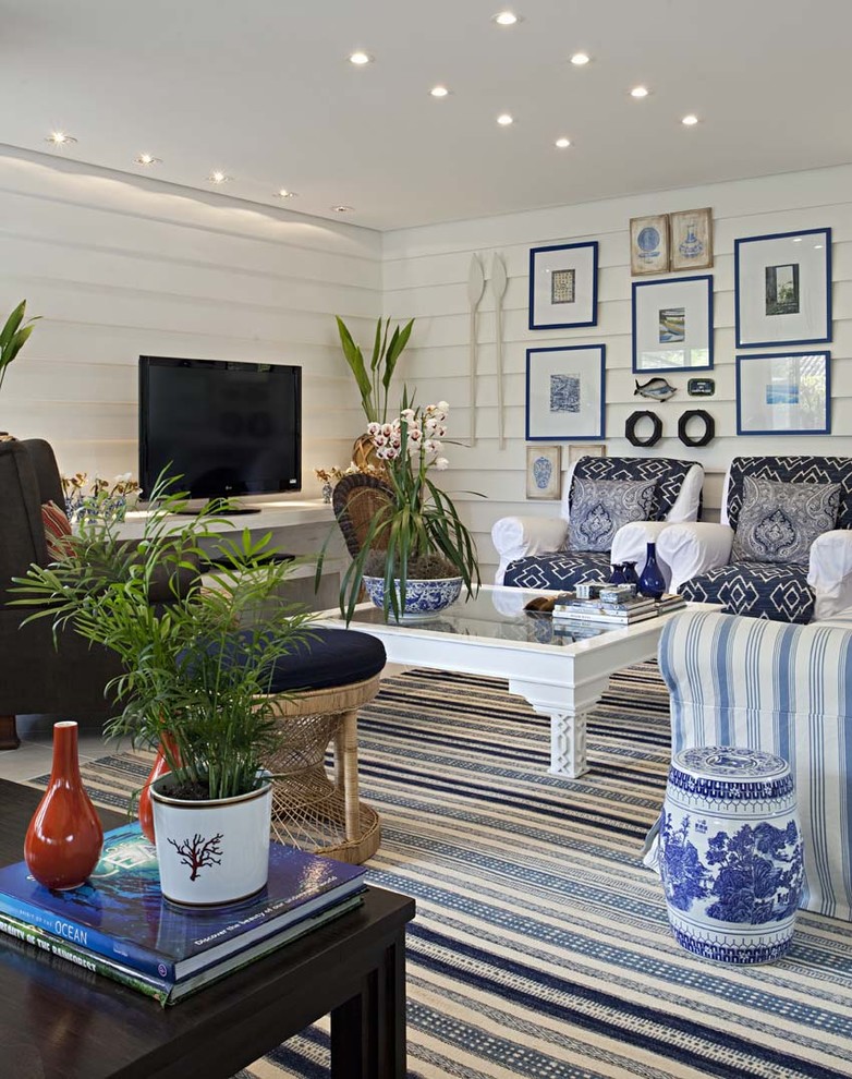 Inspiration for a beach style living room in Other.