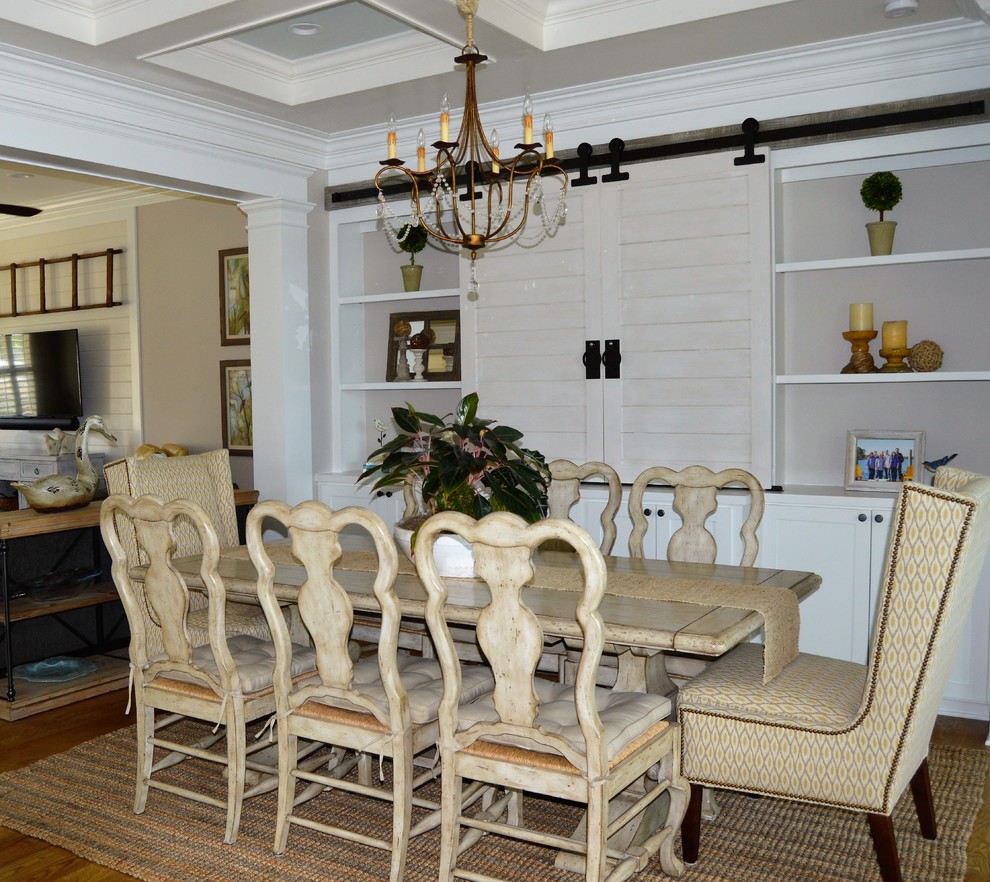 Design ideas for a transitional dining room in Other with grey walls and medium hardwood floors.