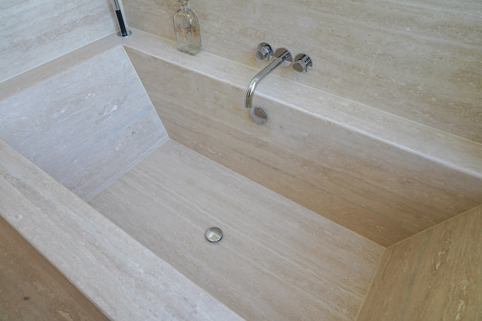 Rénovation d’une salle de bain en pierre naturelle – Paris