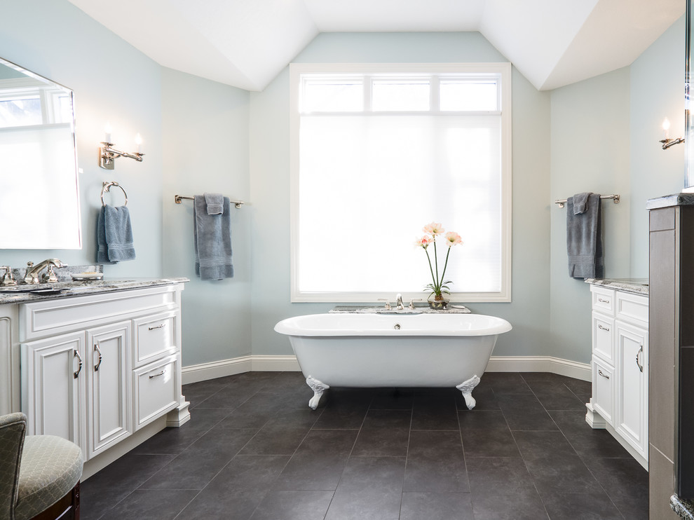 Large traditional master bathroom in Minneapolis with an undermount sink, furniture-like cabinets, white cabinets, engineered quartz benchtops, a claw-foot tub, gray tile, blue tile, multi-coloured tile, blue walls, a corner shower, grey floor, a hinged shower door, matchstick tile and slate floors.