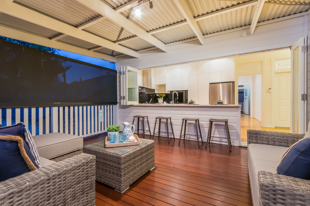 Beach style deck in Brisbane with an awning.