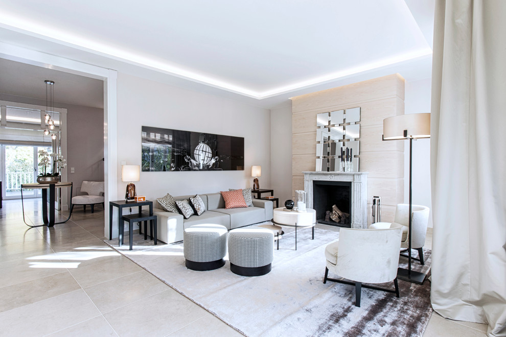Inspiration for a mid-sized transitional formal open concept living room in Hamburg with beige walls and a standard fireplace.