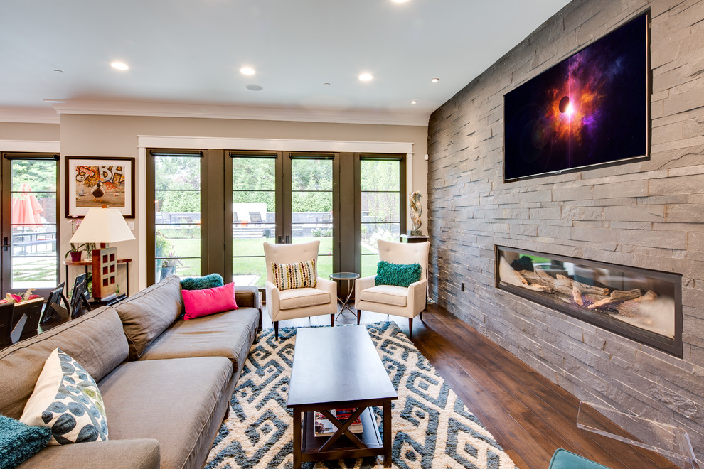 Design ideas for a large contemporary open concept family room in DC Metro with grey walls, medium hardwood floors, a ribbon fireplace, a stone fireplace surround and a built-in media wall.