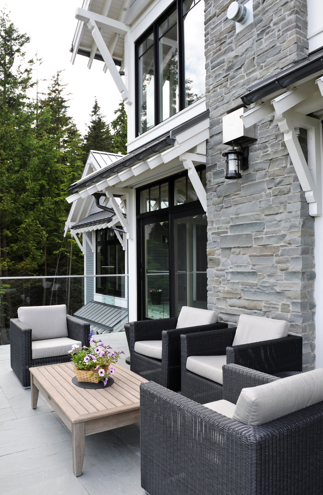 This is an example of a transitional patio in Vancouver with no cover.