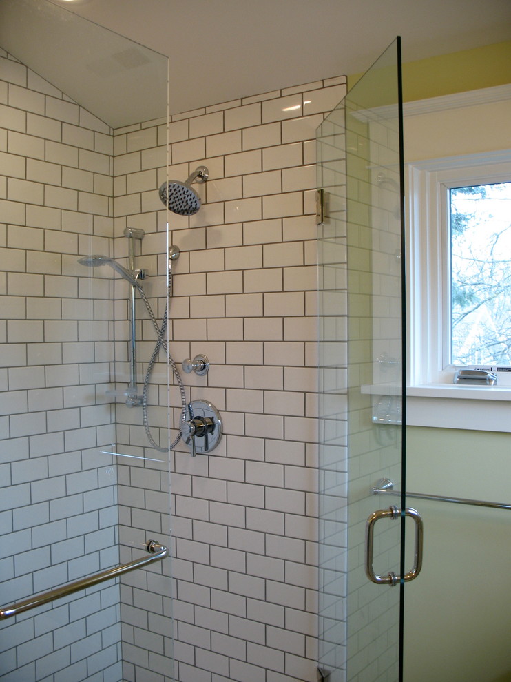 This is an example of an arts and crafts master bathroom in Portland with an undermount sink, an alcove shower, white tile, subway tile and green walls.