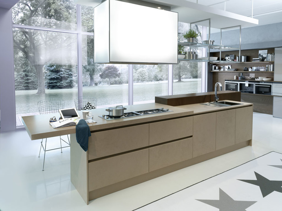 Design ideas for a contemporary single-wall eat-in kitchen in New York with flat-panel cabinets, stainless steel appliances and with island.