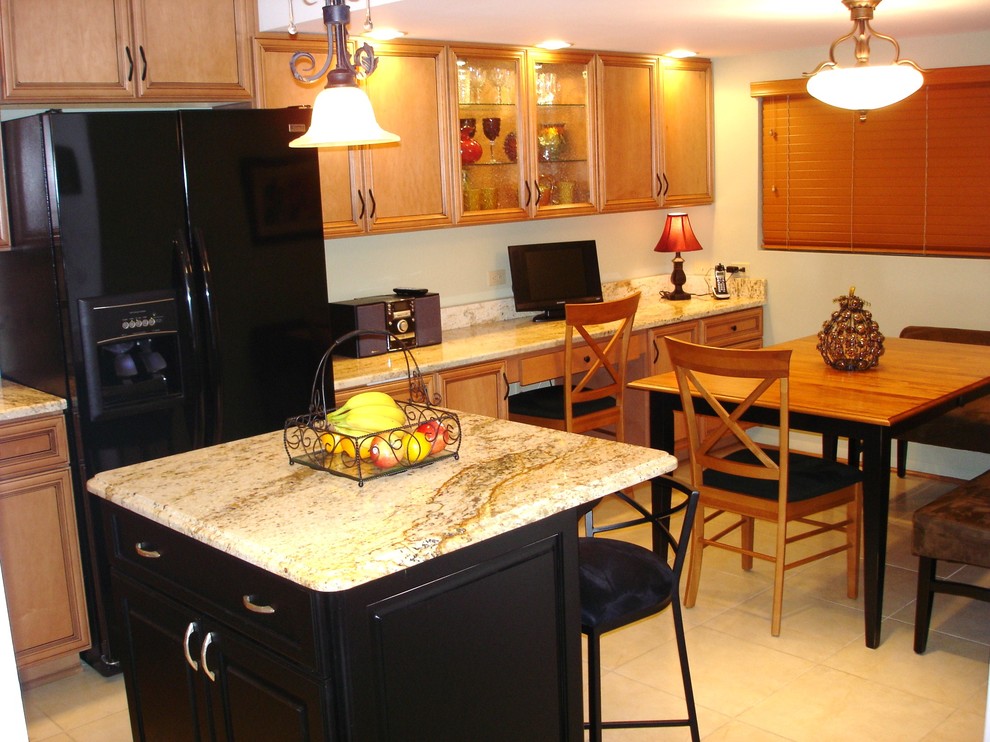 Example of a transitional porcelain tile eat-in kitchen design in Baltimore with an undermount sink, recessed-panel cabinets, medium tone wood cabinets, granite countertops, black appliances, an island and mosaic tile backsplash