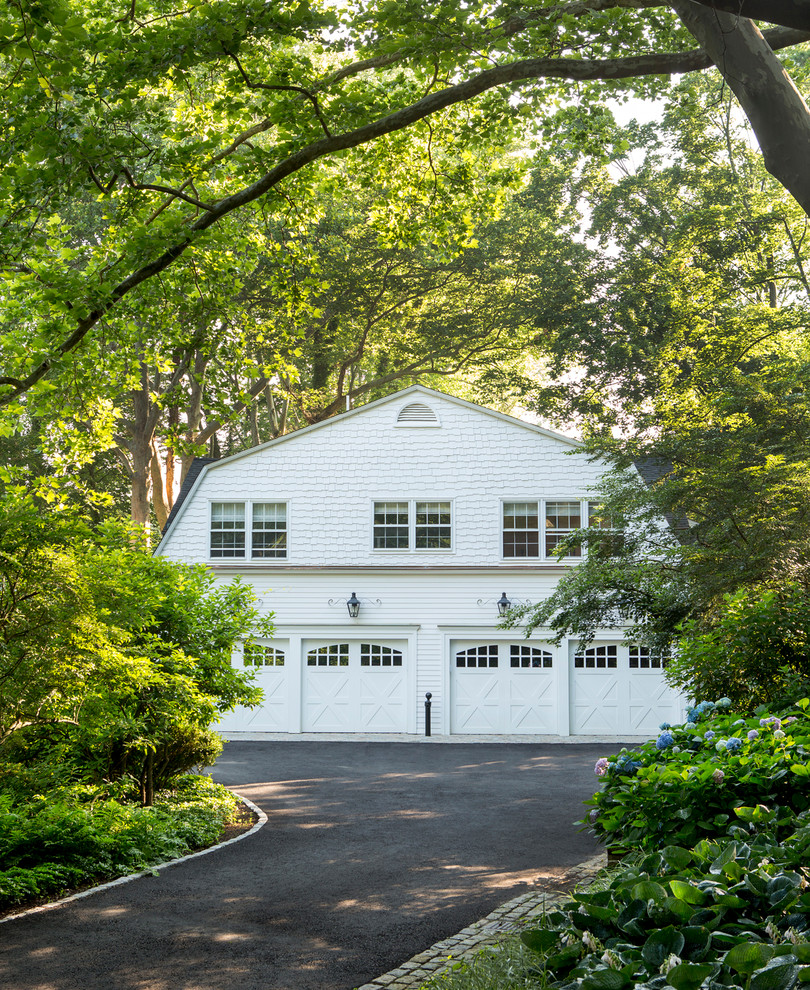 This is an example of an expansive traditional detached four-car garage in New York.
