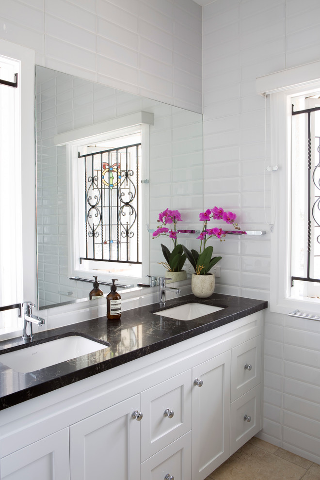 Inspiration for a small transitional 3/4 bathroom in Brisbane with recessed-panel cabinets.