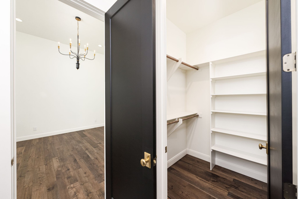 Example of a transitional closet design in Austin
