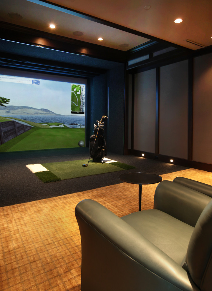 Inspiration for a large timeless enclosed carpeted home theater remodel in Omaha with gray walls and a projector screen