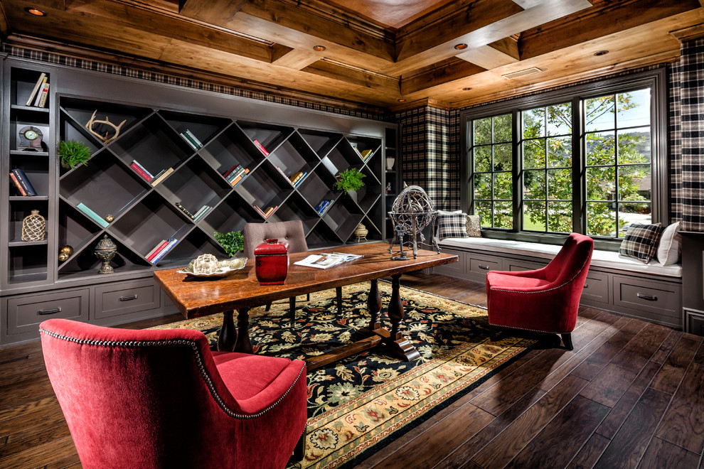 Example of a large transitional freestanding desk dark wood floor study room design in Los Angeles with gray walls and no fireplace