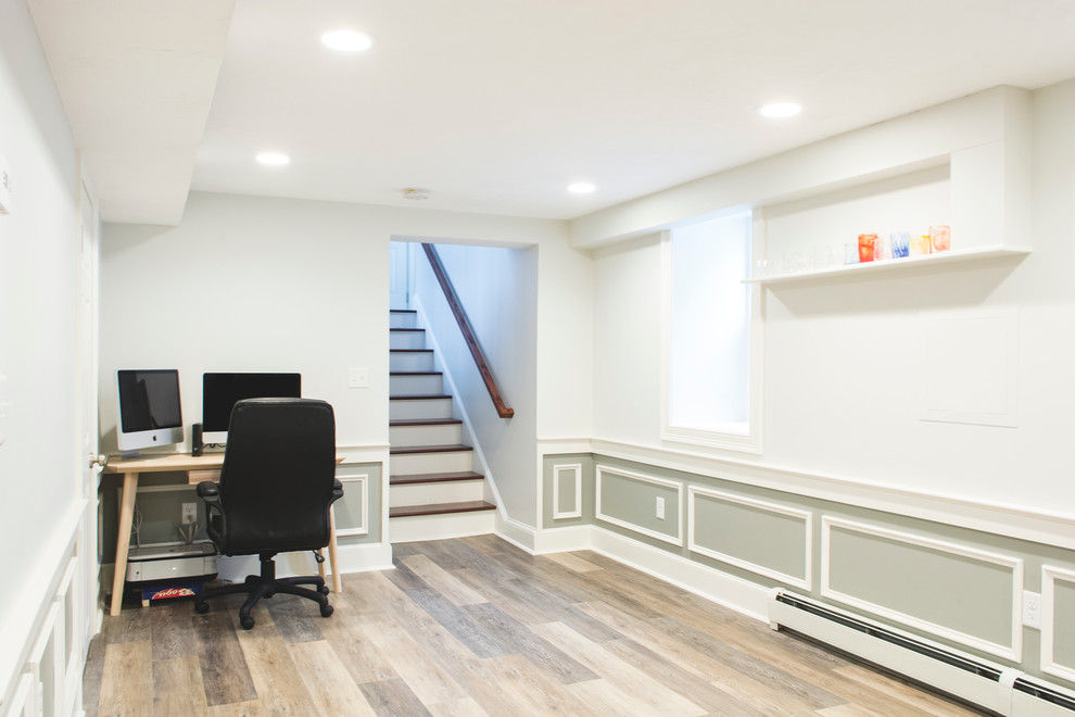 Home design - transitional medium tone wood floor home design idea in Boston with white walls