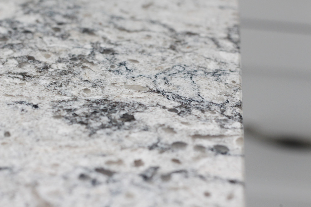 Inspiration for an u-shaped kitchen remodel with shaker cabinets, white cabinets, quartzite countertops, gray backsplash, subway tile backsplash, a peninsula and gray countertops