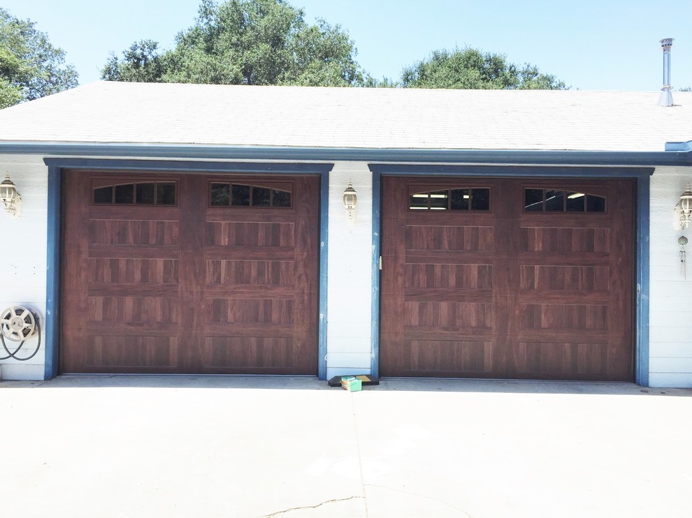 Inspiration for a mid-sized country attached two-car garage in San Diego.
