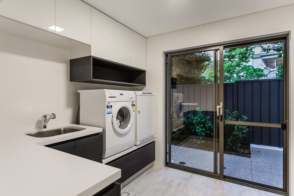 This is an example of a contemporary laundry room in Perth.