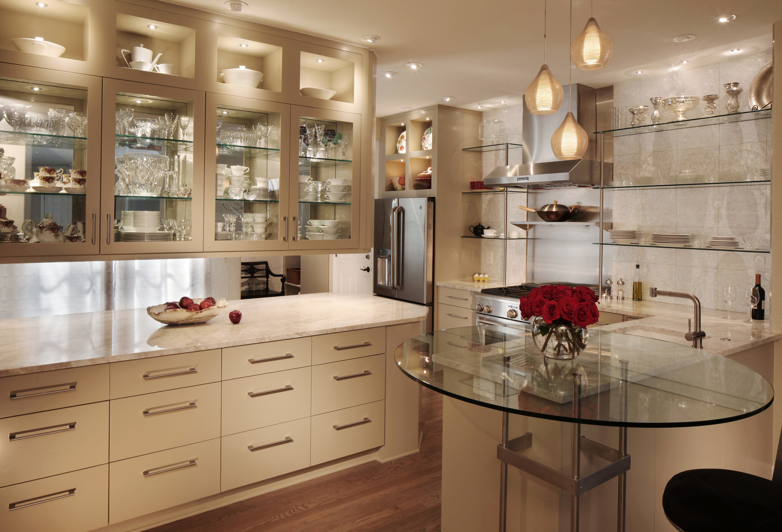 A Modern kitchen in every sense.  Smart technology, welcoming, soft palette, open to the rest of the house, makes this a dream kitchen.