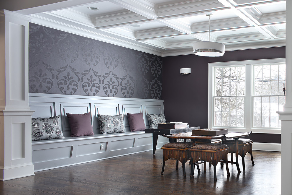 Design ideas for a dining room in New York with purple walls, dark hardwood floors and no fireplace.