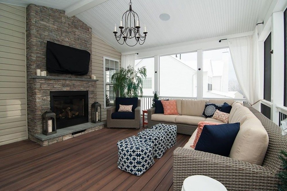 Example of a transitional backyard balcony deck design in Baltimore with a roof extension