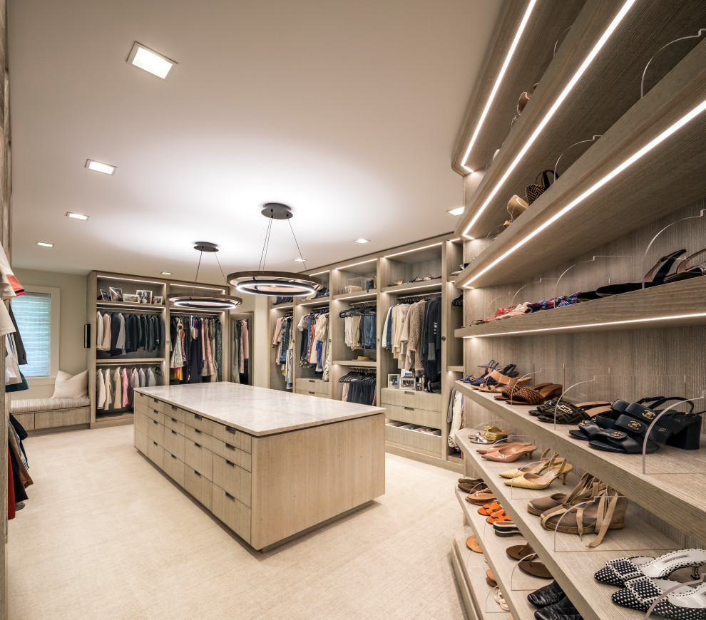 This is an example of a large contemporary storage and wardrobe in Austin.