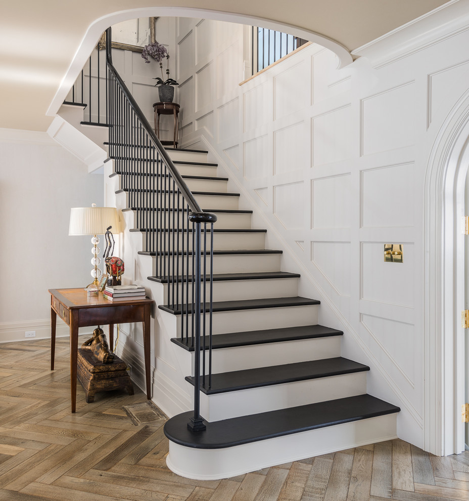 Inspiration for a traditional painted wood l-shaped staircase in New York with painted wood risers.