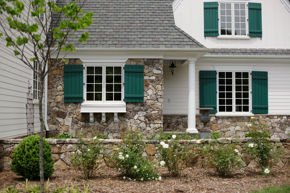 Photo of a traditional exterior in Richmond with wood siding.