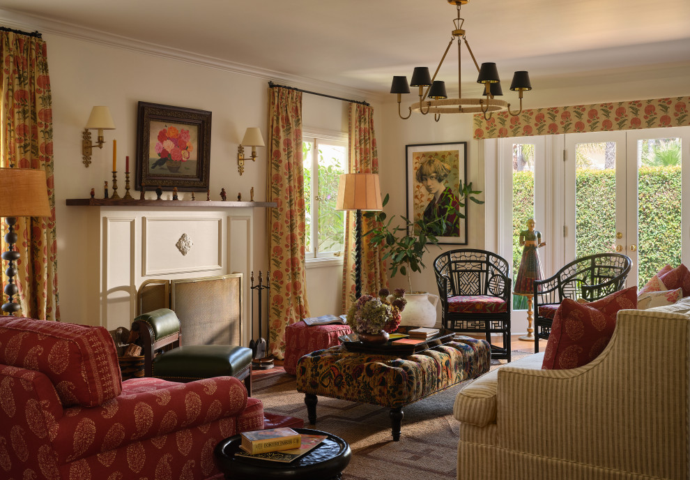 Inspiration for a timeless medium tone wood floor and brown floor living room remodel in Los Angeles with beige walls and a standard fireplace