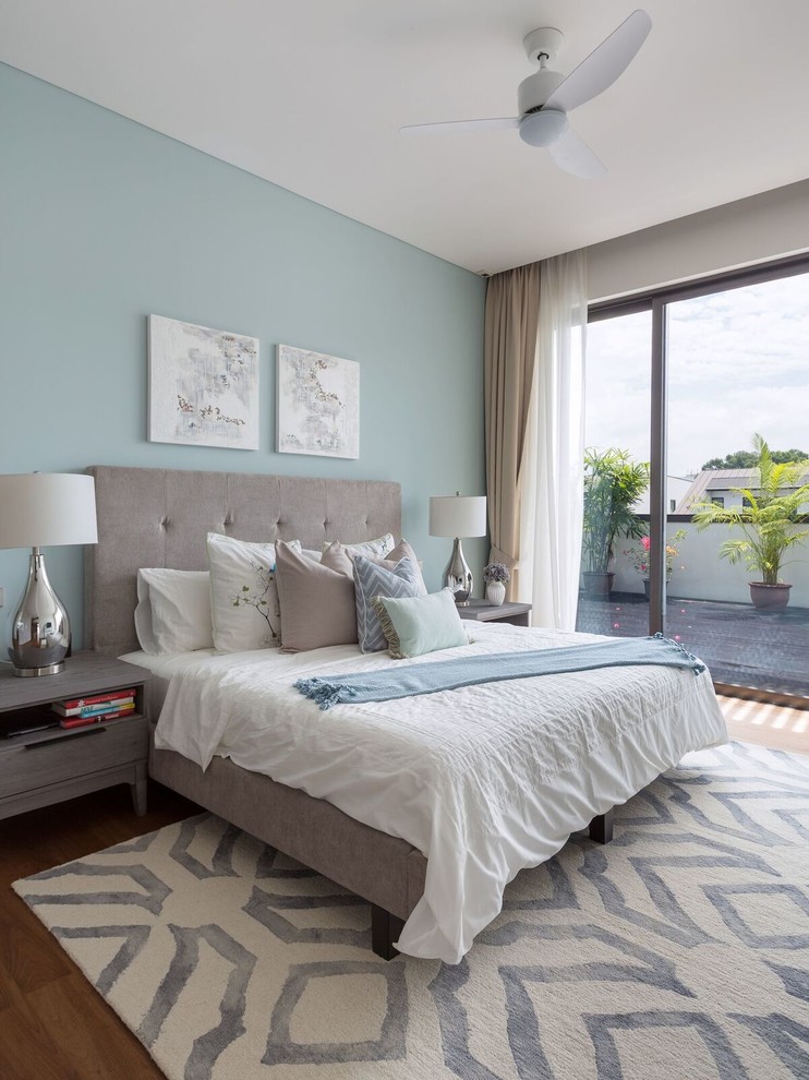 Example of a beach style bedroom design in Singapore
