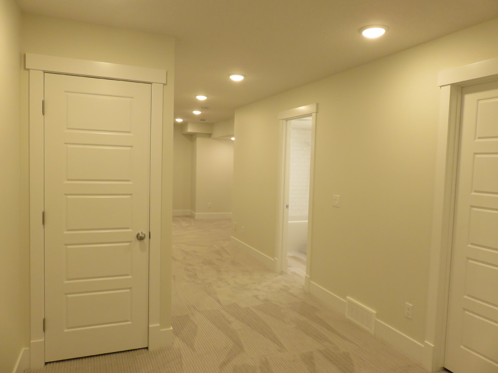 Mid-sized transitional home design photo in Calgary