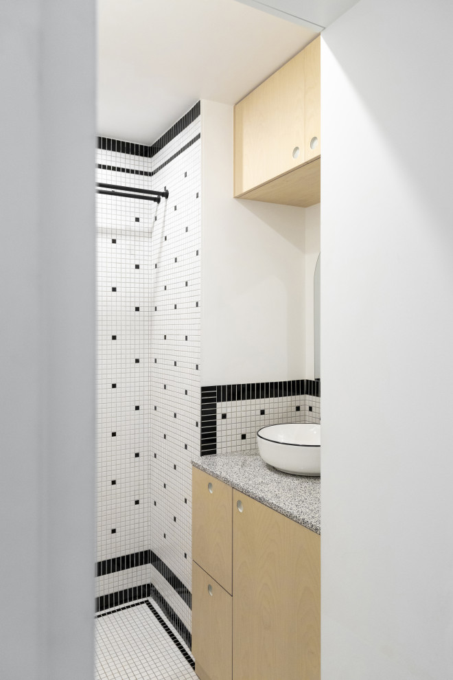 This is an example of a small modern master bathroom in Paris with beaded inset cabinets, light wood cabinets, an open shower, white tile, mosaic tile, white walls, mosaic tile floors, a drop-in sink, terrazzo benchtops, white floor, an open shower, grey benchtops, a single vanity and a built-in vanity.