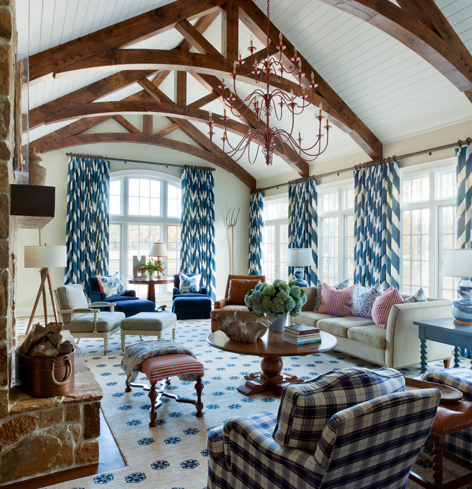 Large cottage open concept carpeted family room photo in Little Rock with beige walls, a standard fireplace and a stone fireplace