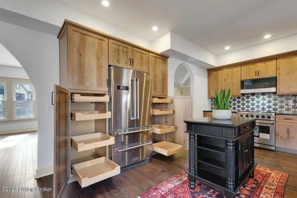 Kitchen - mid-sized transitional l-shaped medium tone wood floor kitchen idea with an undermount sink, shaker cabinets, light wood cabinets and an island