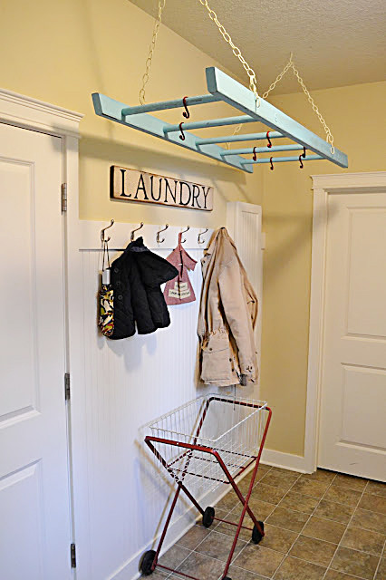 Example of an eclectic laundry room design in Other