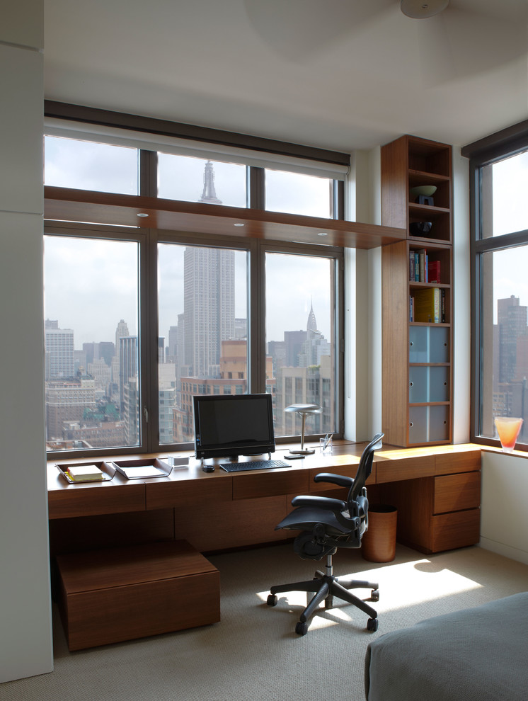 Inspiration for a mid-sized contemporary home office in New York with a built-in desk.