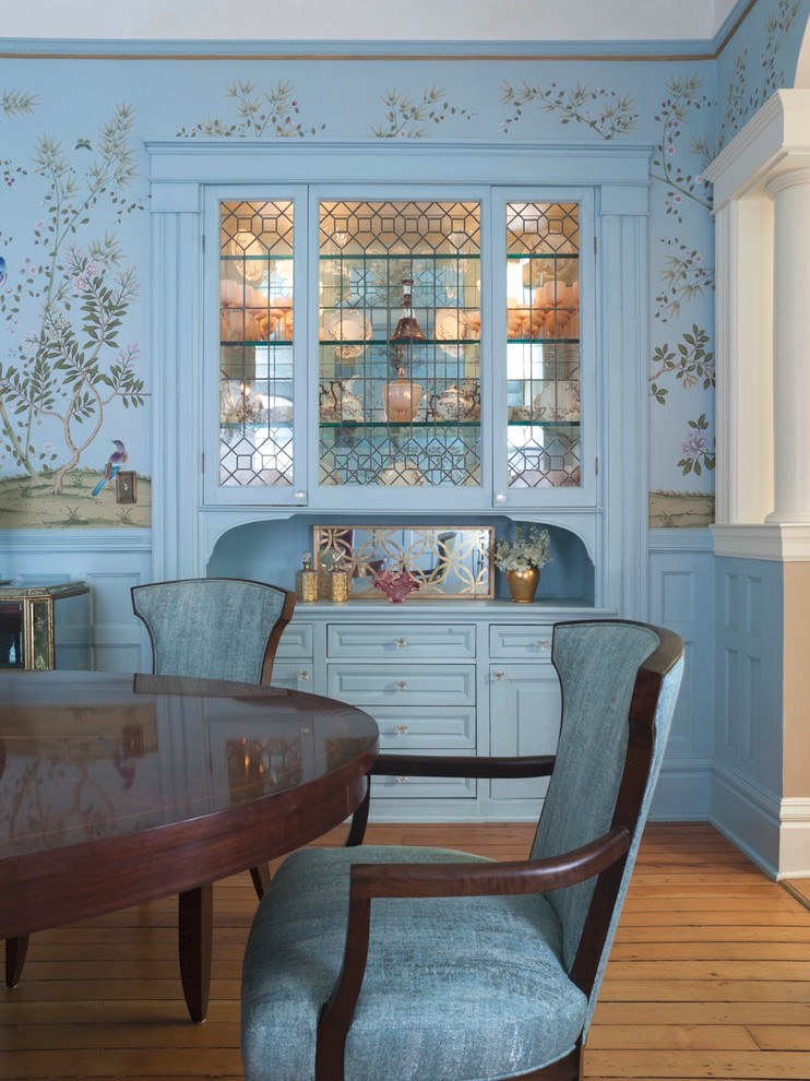 This is an example of a traditional dining room in San Francisco with blue walls.