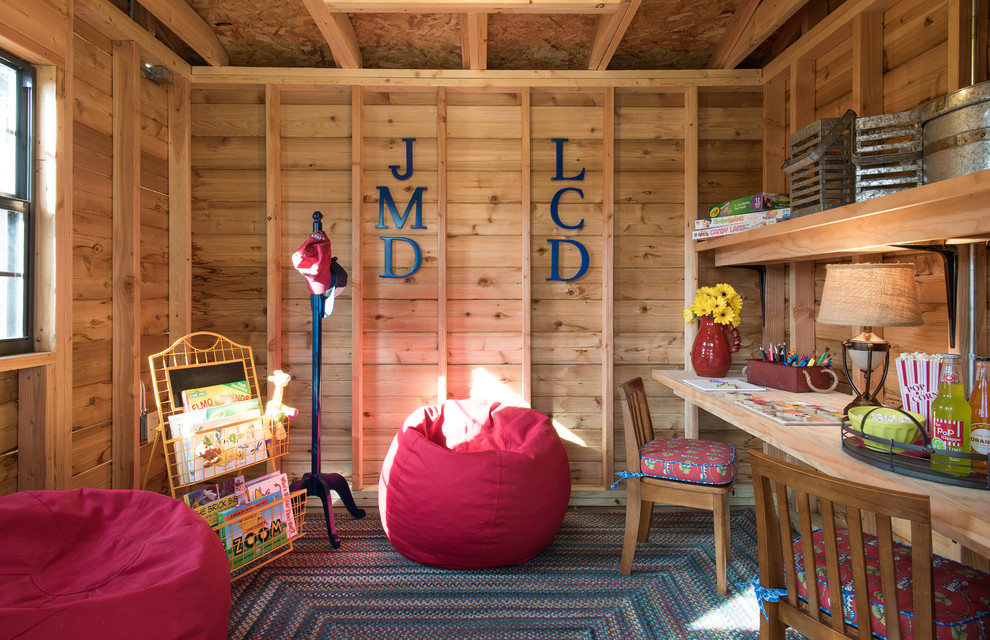 Inspiration for a small country gender-neutral kids' playroom for kids 4-10 years old in Dallas with concrete floors.