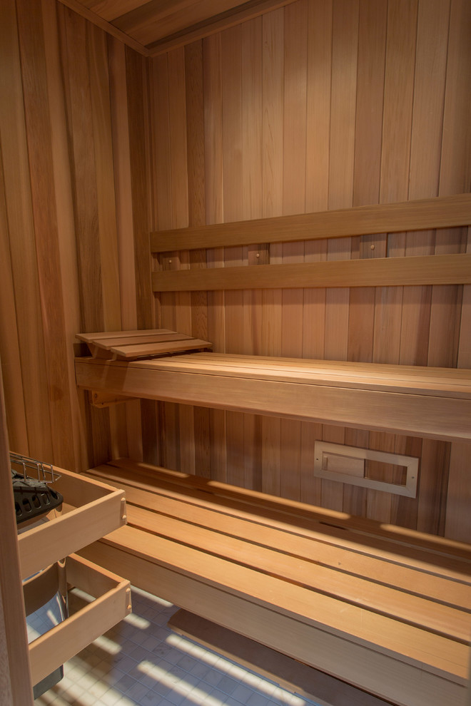 This is an example of a traditional bathroom in New York with with a sauna.