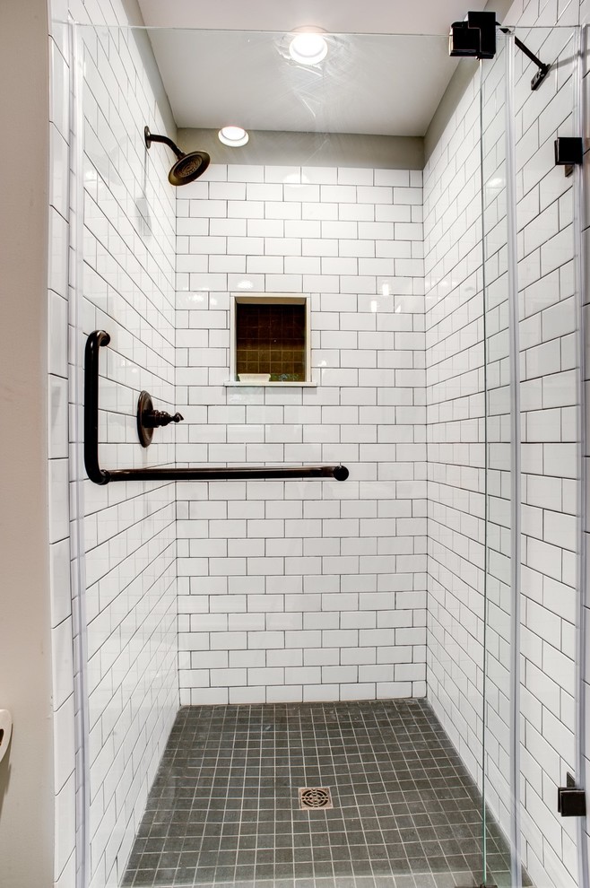 Inspiration for a mid-sized transitional master white tile and subway tile gray floor alcove shower remodel with white walls and a hinged shower door
