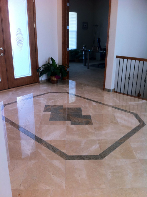 Example of a mid-sized transitional marble floor front door design in Denver with beige walls and a brown front door