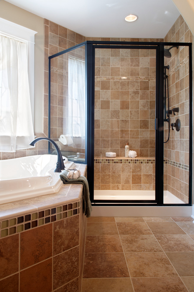 Example of a transitional beige tile corner shower design with a hot tub