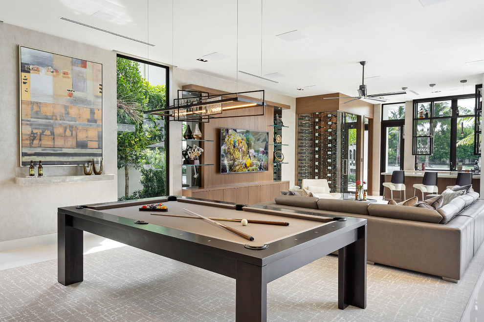 Design ideas for a contemporary open concept family room in Miami with a game room and grey walls.