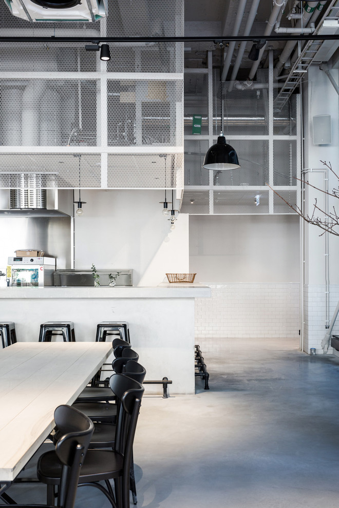 Design ideas for an industrial dining room in Stockholm.