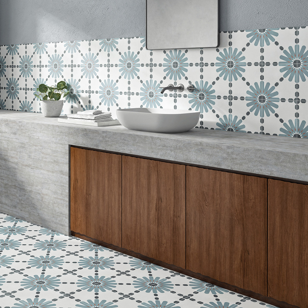 Bathroom - mediterranean blue tile and porcelain tile single-sink bathroom idea in New York with medium tone wood cabinets and a built-in vanity