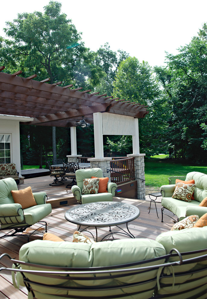 Design ideas for a large transitional backyard patio in Indianapolis with a fire feature and a pergola.