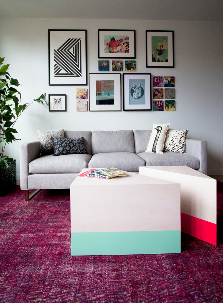 Inspiration for a small contemporary living room in Portland with white walls and carpet.